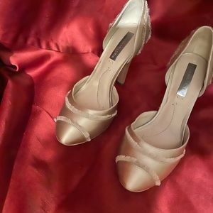 Cream color BCBG Max Azria heels.